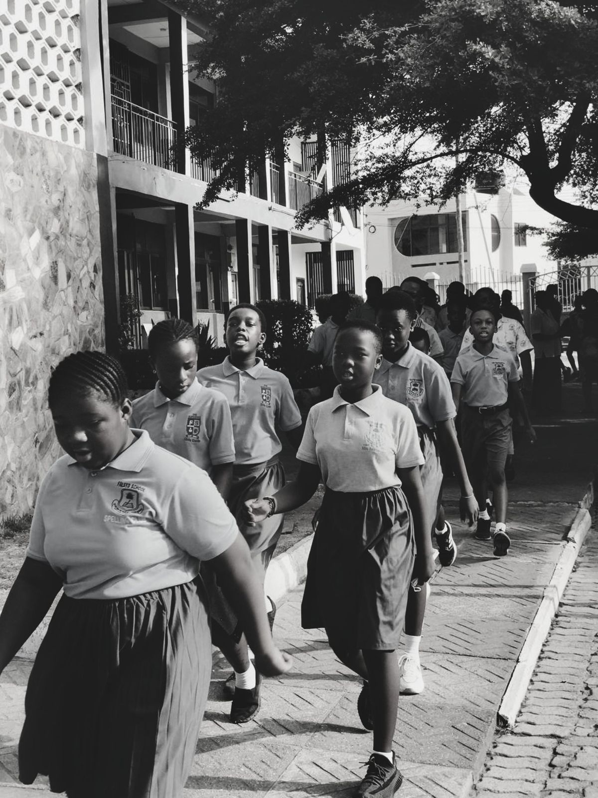 Students walking together outside a school building